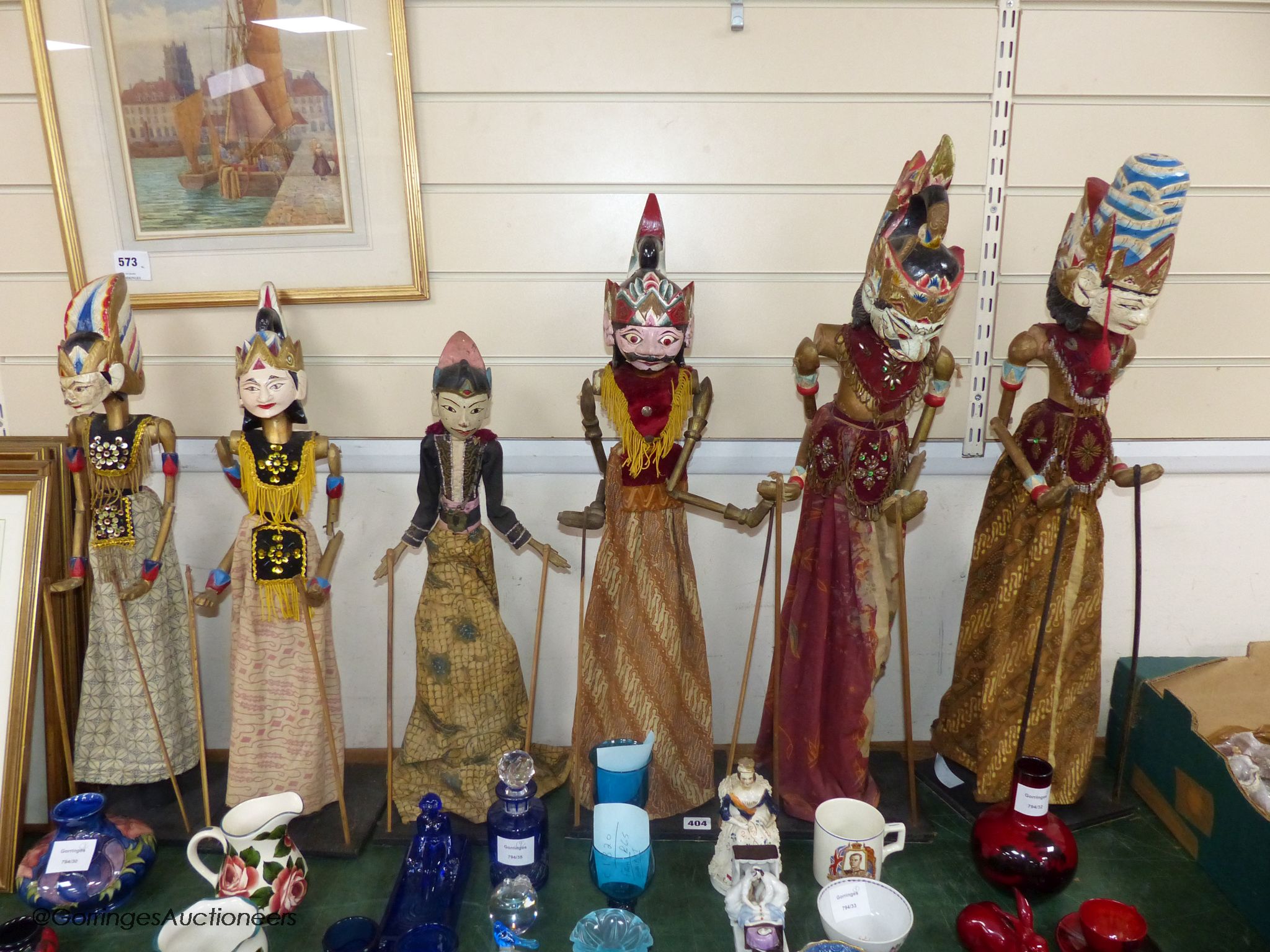 A collection of Indonesian stick puppets, tallest 76cm